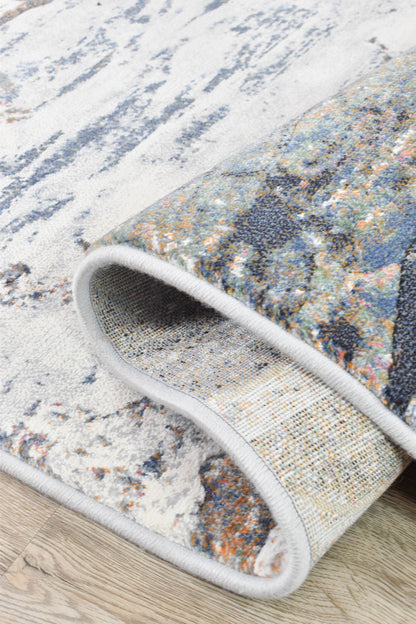 Garcia River Rock floor rug