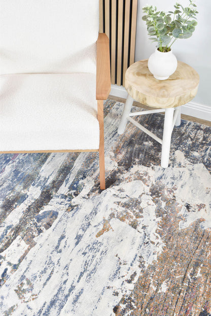 Garcia River Rock floor rug